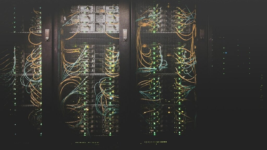 Network cables and data center infrastructure representing observability across applications and IT systems