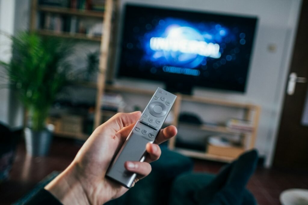 Smart television showing a live TV streaming experience in a living room