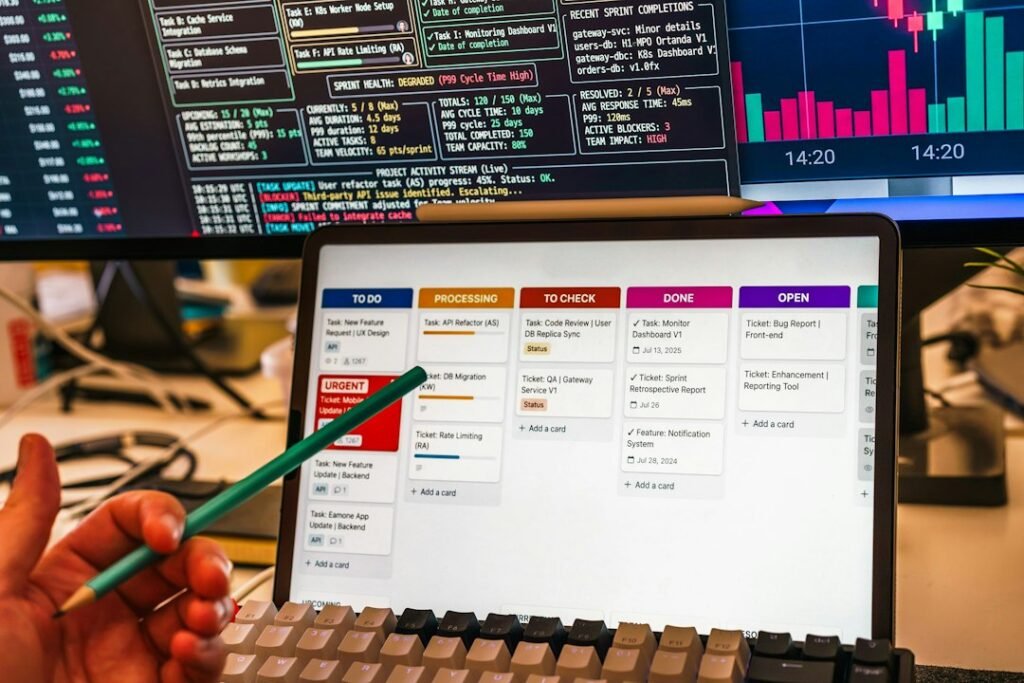 IT service management workspace with a tablet displaying a task dashboard