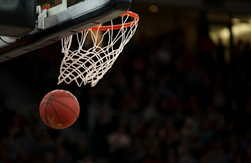 Basketball game representing free live sports streaming and CrackStreams alternatives
